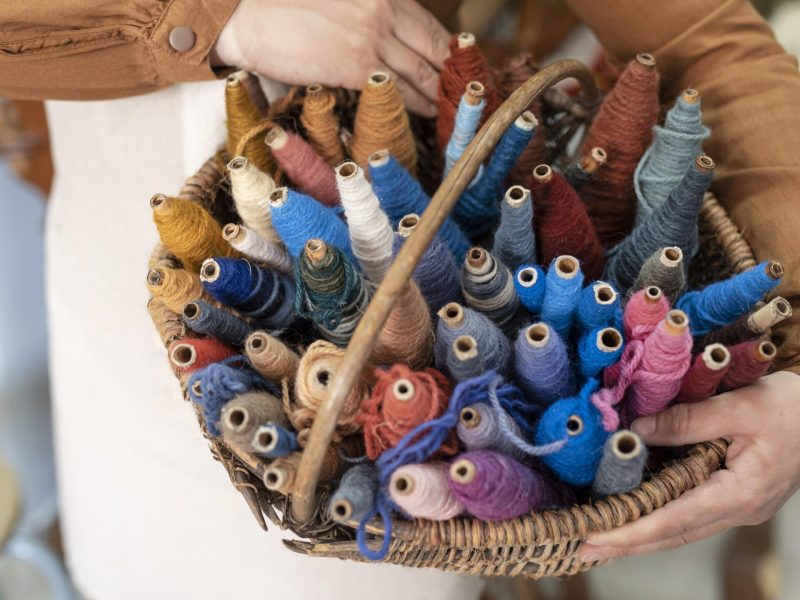 person-working-embroidery-workshop