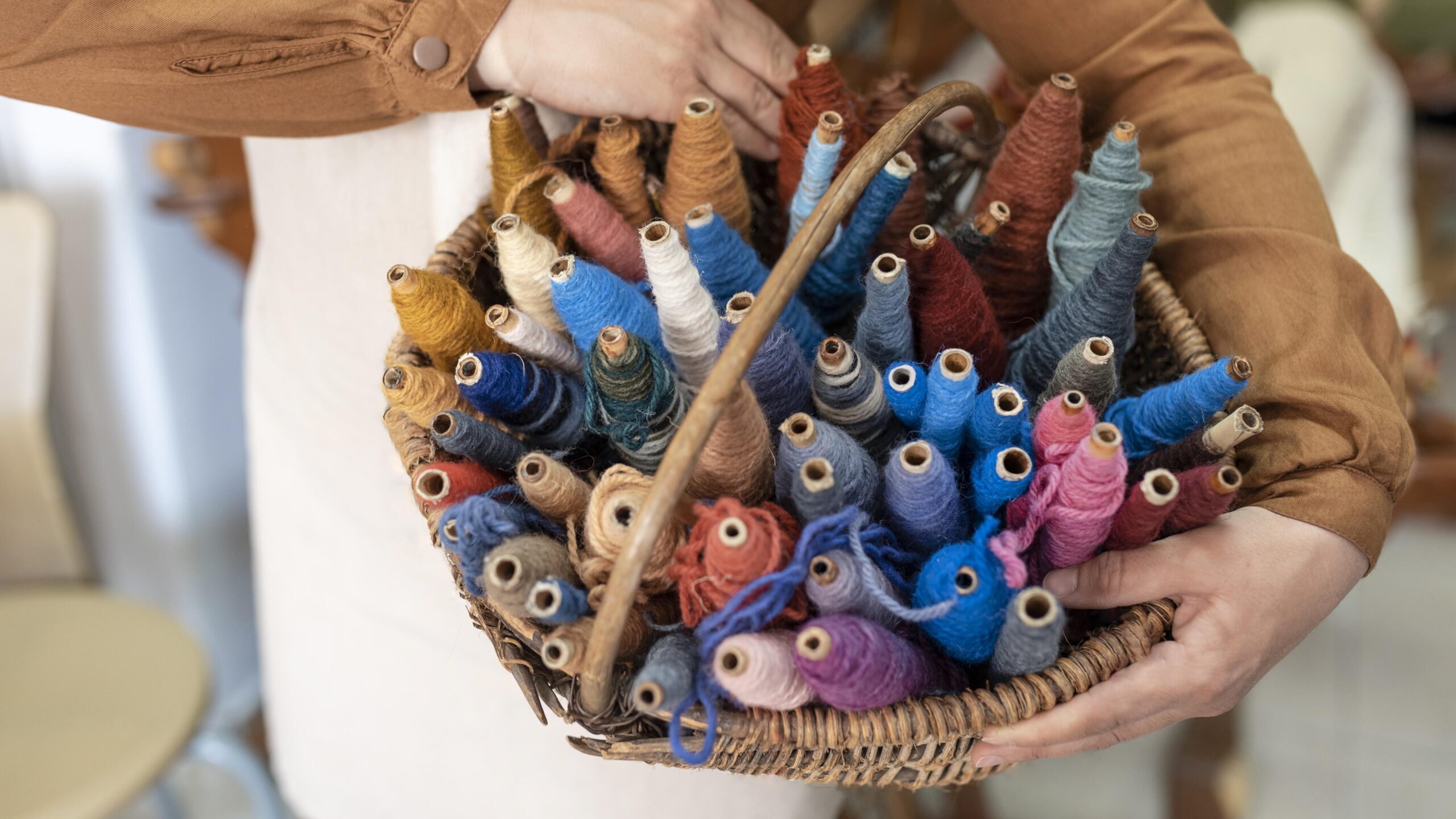person-working-embroidery-workshop